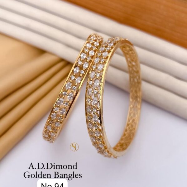 A.d dimond golden bangles